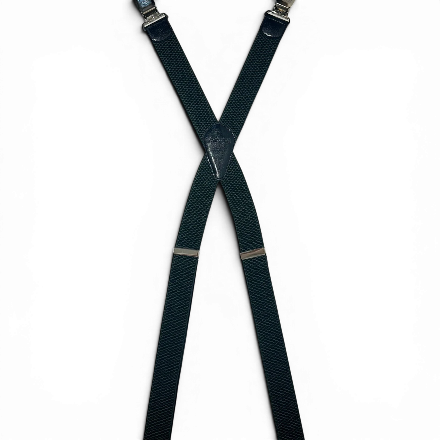 Binoklipood X-back elastic suspenders in dark green with leather accents and silver clasps. Adjustable straps for a secure fit.