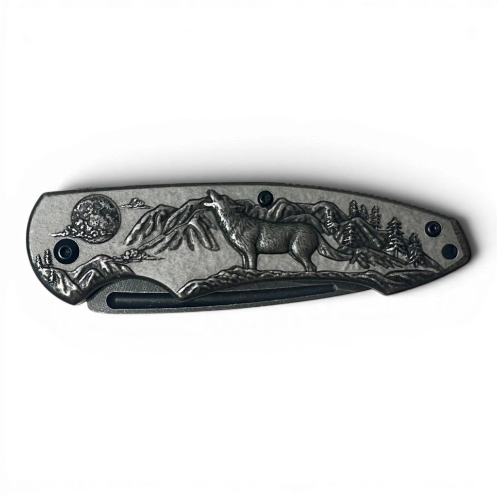 Binoklipood folding pocket knife with embossed wildlife scene, deer and forest landscape. Stainless steel blade.