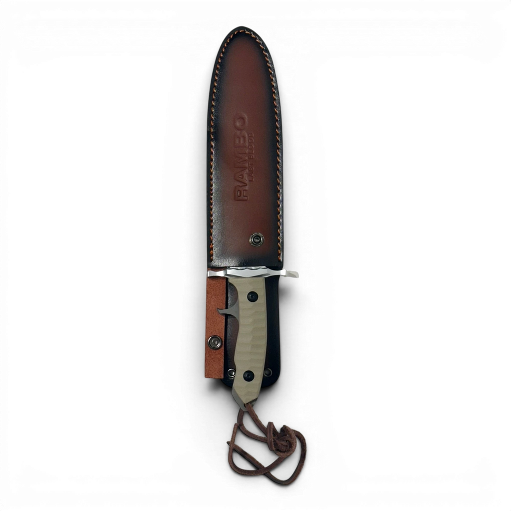 Binoklipood Rambo Last Blood survival knife with tan textured handle and brown leather sheath. Stainless steel blade.