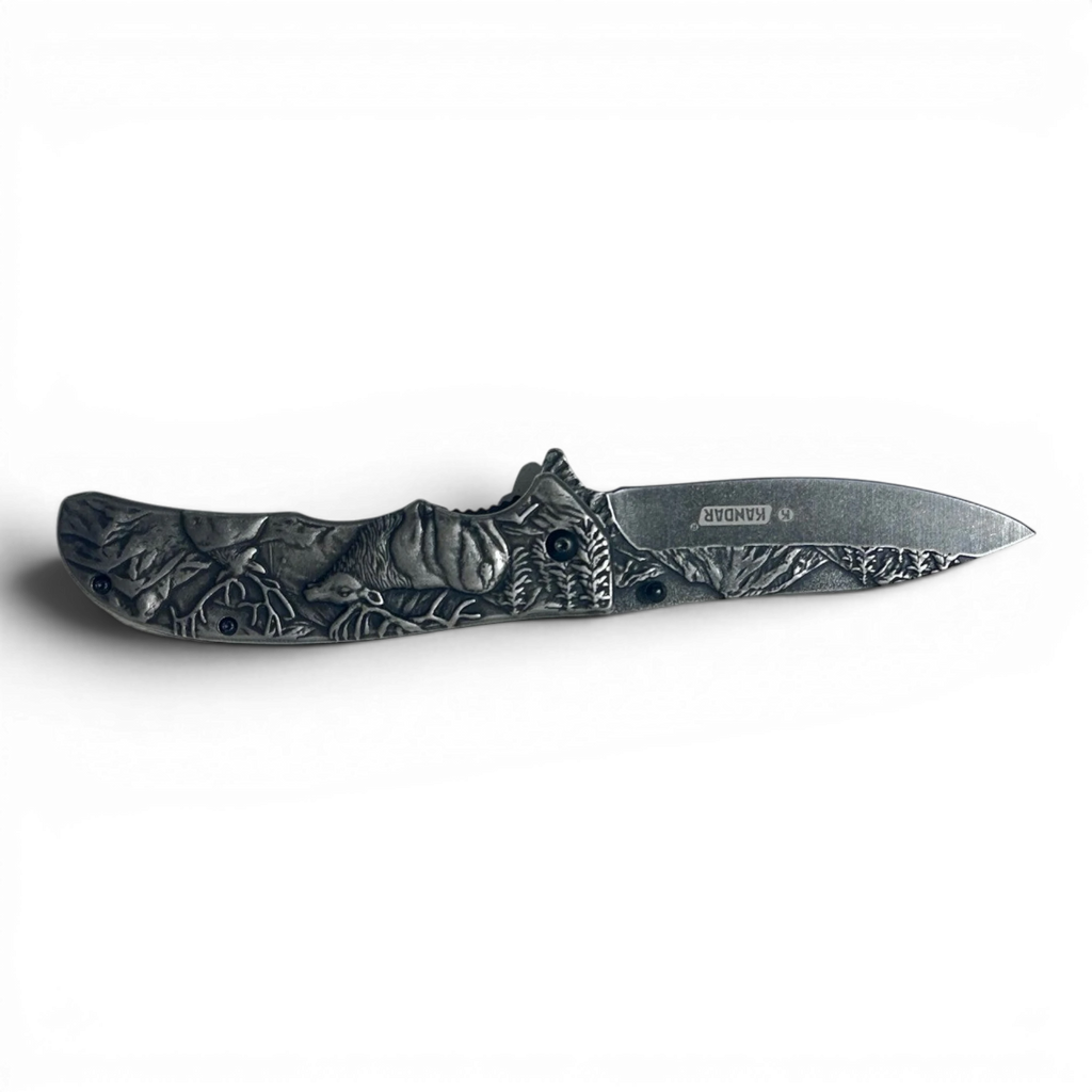 Binoklipood Ranger folding pocket knife with detailed silver handle featuring a forest scene with wildlife. Metal construction.