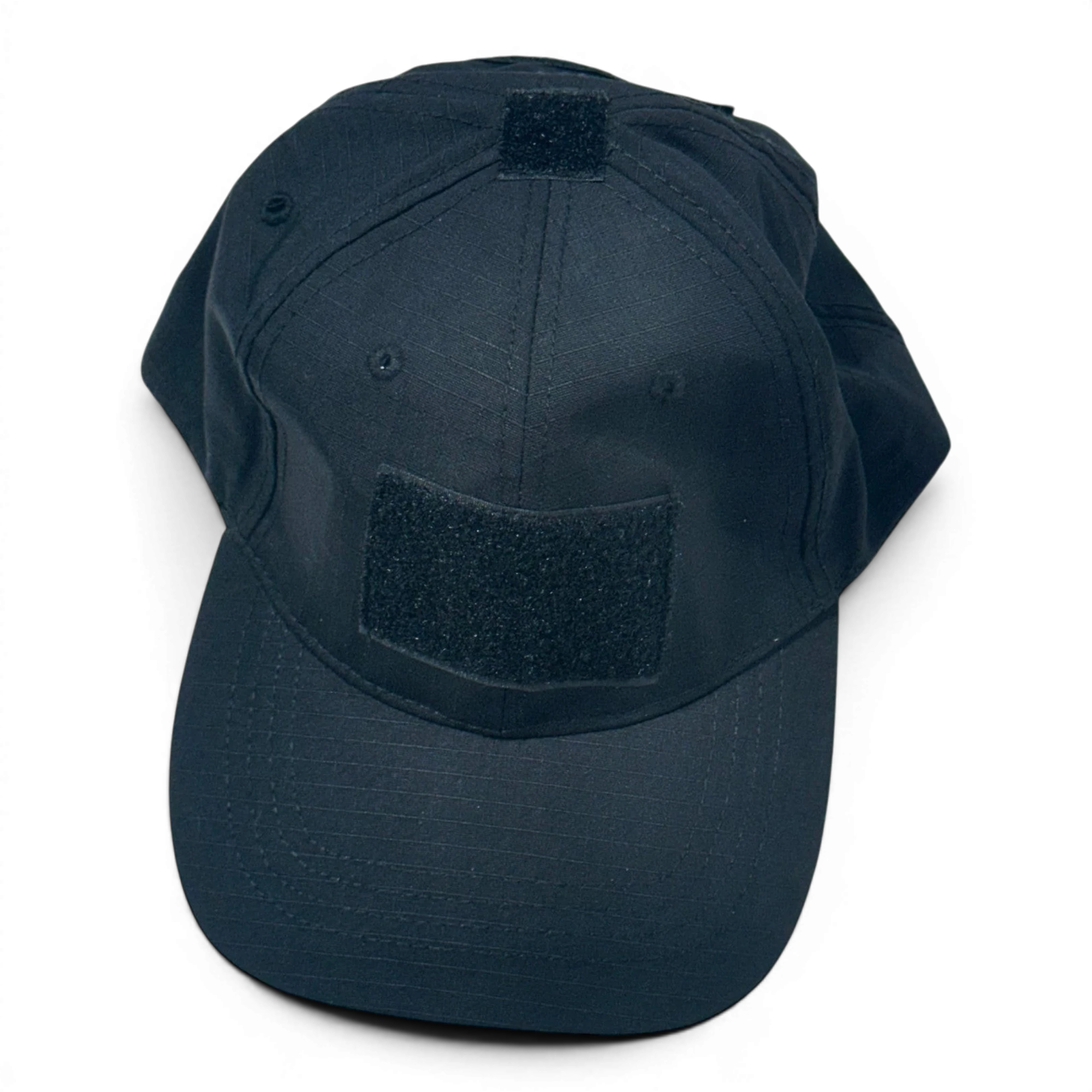 Binoklipood black tactical baseball cap with loop fastener patch on front and top, made of ripstop fabric.